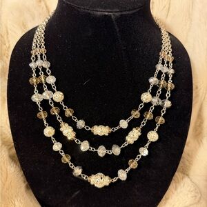 Elegant Multi-Layered Gold and Silver Necklace